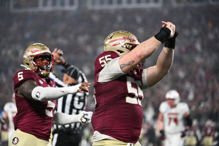 Dec 2, 2023; Charlotte, NC, USA; Florida State Seminoles defensive lineman Braden Fiske (55) gestures to his ring finger after sacking Louisville Cardinals quarterback Jack Plummer (not pictured) in the fourth quarter at Bank of America Stadium. Mandatory Credit: Bob Donnan-USA TODAY Sports